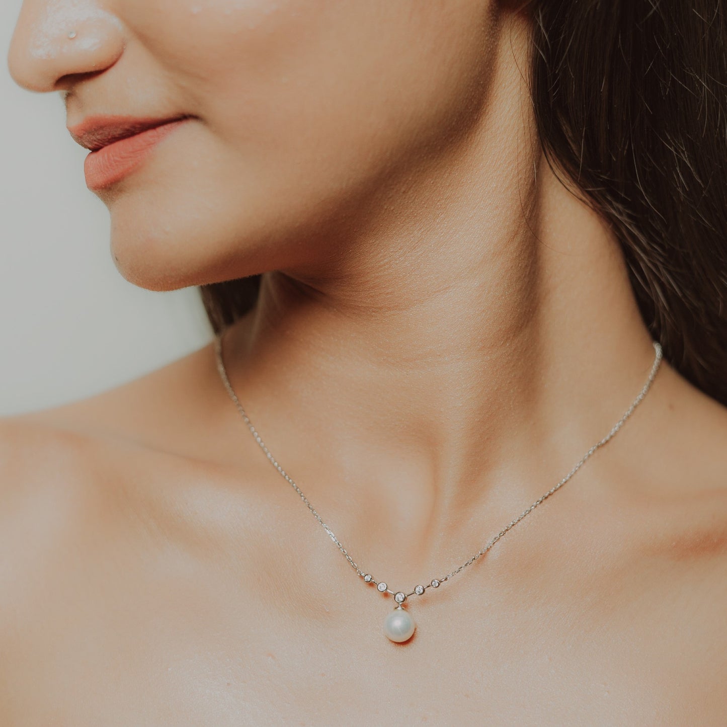 Silver V-Shaped Zircon and Pearl Pendant Necklace