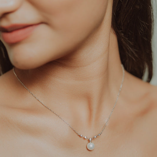 Silver V-Shaped Zircon and Pearl Pendant Necklace
