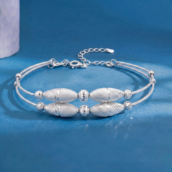 The Contemporary Textured Spindle Silver Kada