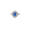 Elegant Emerald-Cut Blue Sapphire and Diamond Cocktail Ring in White Gold